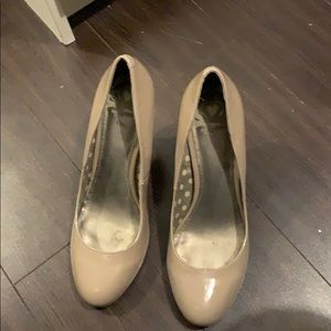 Beige coloured pumps